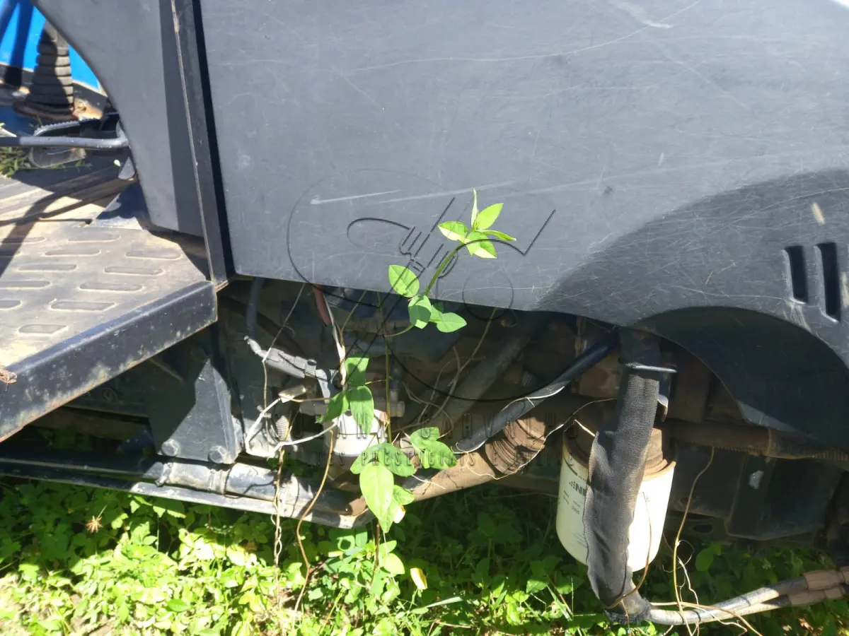 LOTE 013 - TRATOR NEW HOLLAND